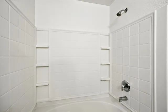 a bathroom with a bathtub