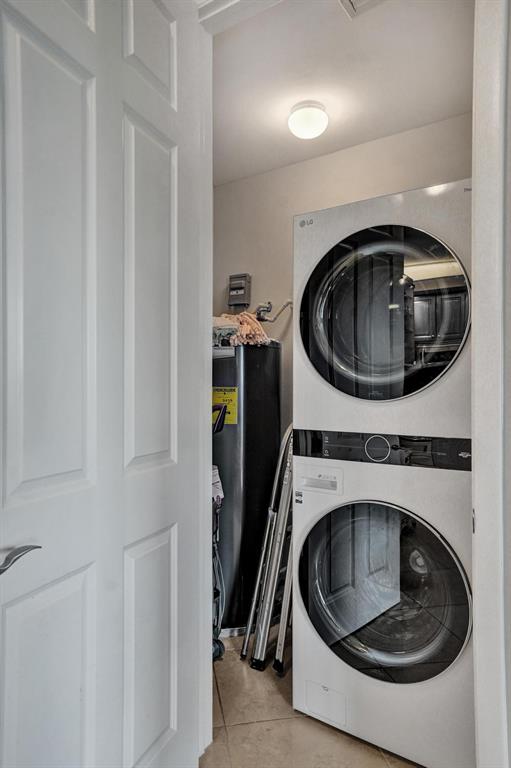 2633 Northeast 14th Avenue, Unit 400 Wilton Manors, FL 33334 - Photo 47 of 74 a utility room with dryer and washer