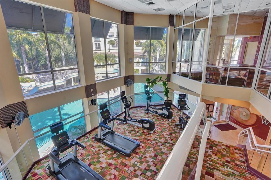 2633 Northeast 14th Avenue, Unit 400 Wilton Manors, FL 33334 - Photo 54 of 74 a living room with furniture and a window