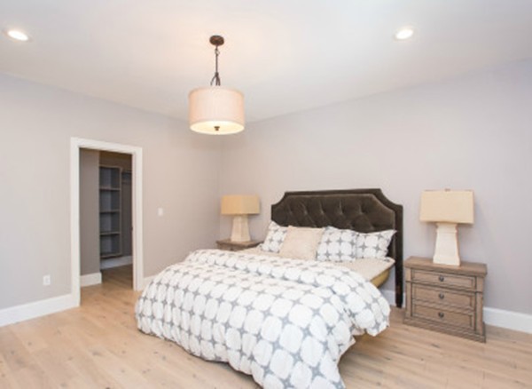 12 Suban Place, Unit 2 Newton, MA 02461 - Photo 10 of 13 a bedroom with a bed and a lamp