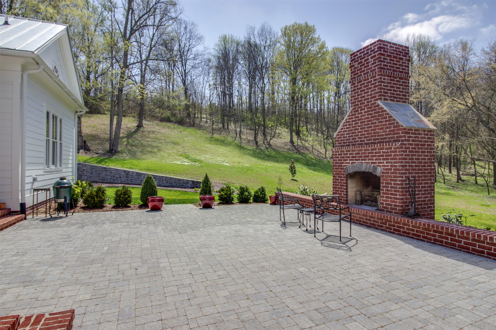 3533 Bailey Road Franklin, TN 37064 - Photo 26 of 29 a view of a house with a patio and a yard