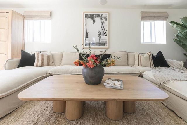 a bedroom with a bed and a cabinets