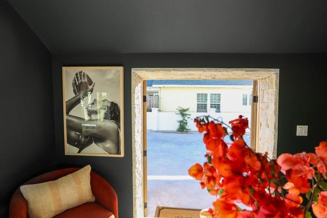 a view of a potted plant sitting in front of a house