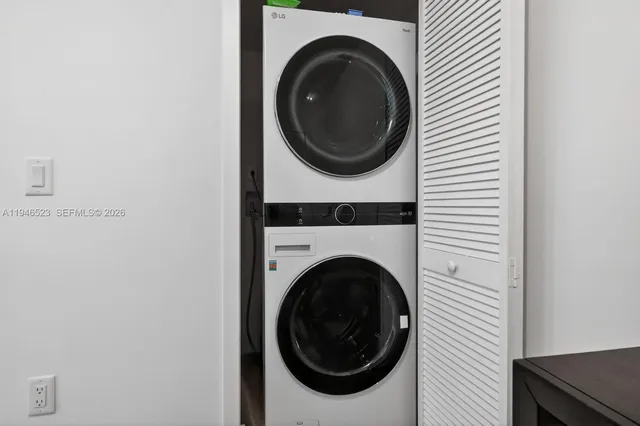 a utility room with dryer and washer