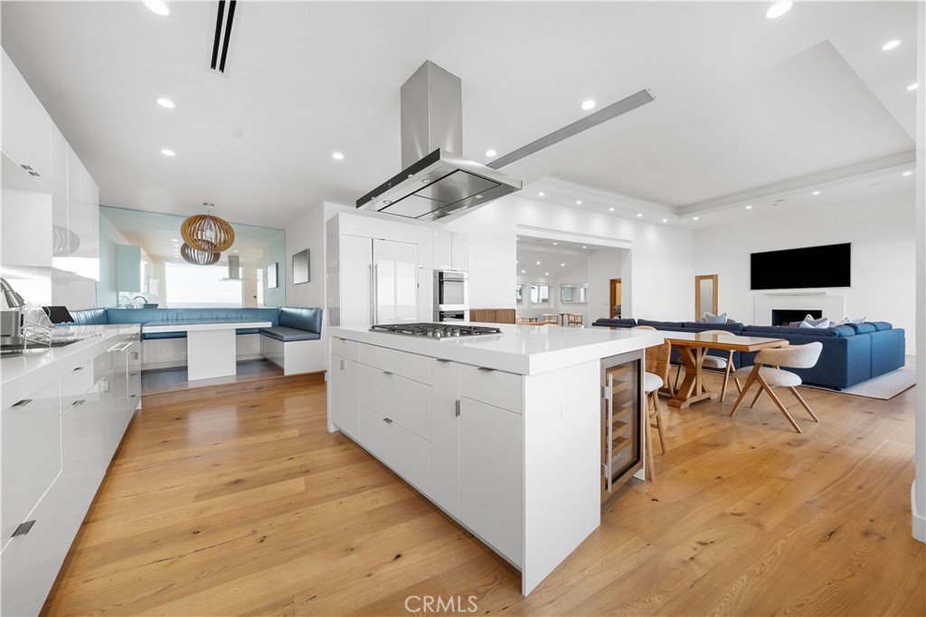 31654 Broad Beach Road Malibu, CA 90265 - Photo 18 of 75 a large white kitchen with cabinets a sink and a stove