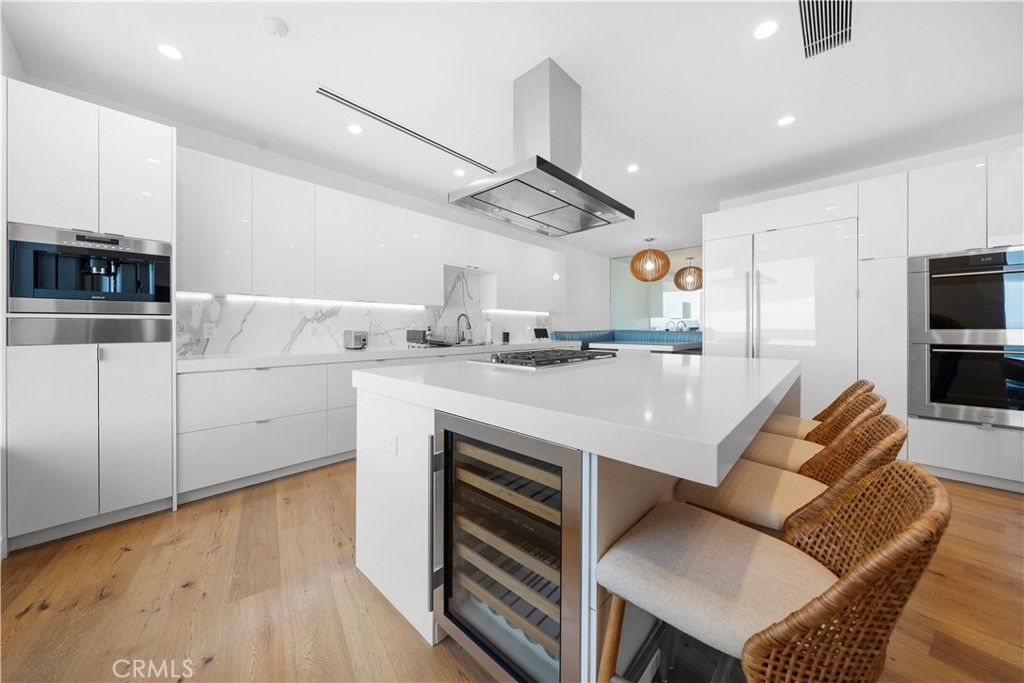 31654 Broad Beach Road Malibu, CA 90265 - Photo 24 of 75 a kitchen with stainless steel appliances a stove a sink a microwave a refrigerator and cabinets