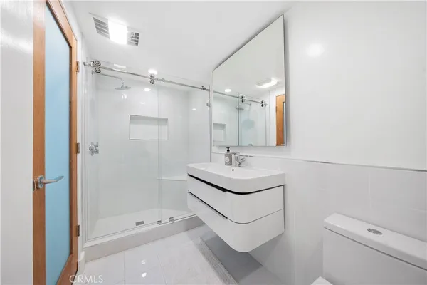 a bathroom with a bathtub and a sink
