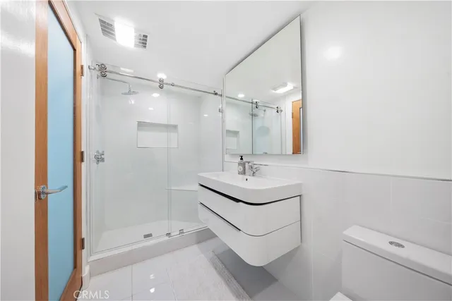a bathroom with a bathtub and a sink