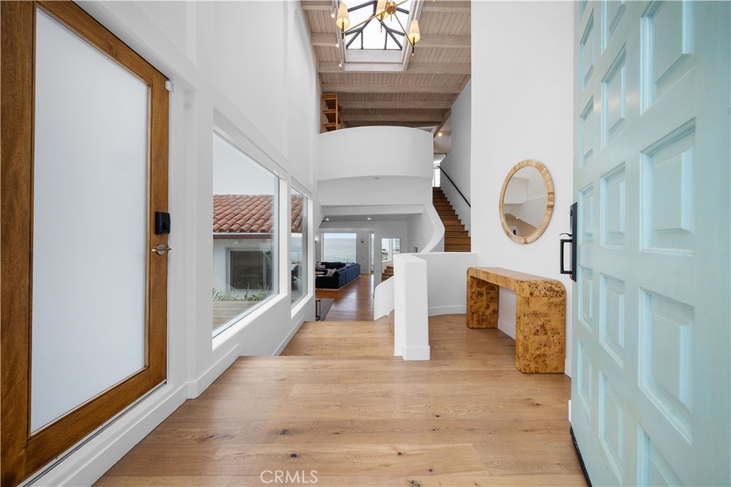 31654 Broad Beach Road Malibu, CA 90265 - Photo 6 of 75 a view of an entryway with wooden floor