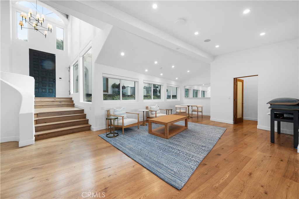 31654 Broad Beach Road Malibu, CA 90265 - Photo 7 of 75 a living room with furniture and a wooden floor