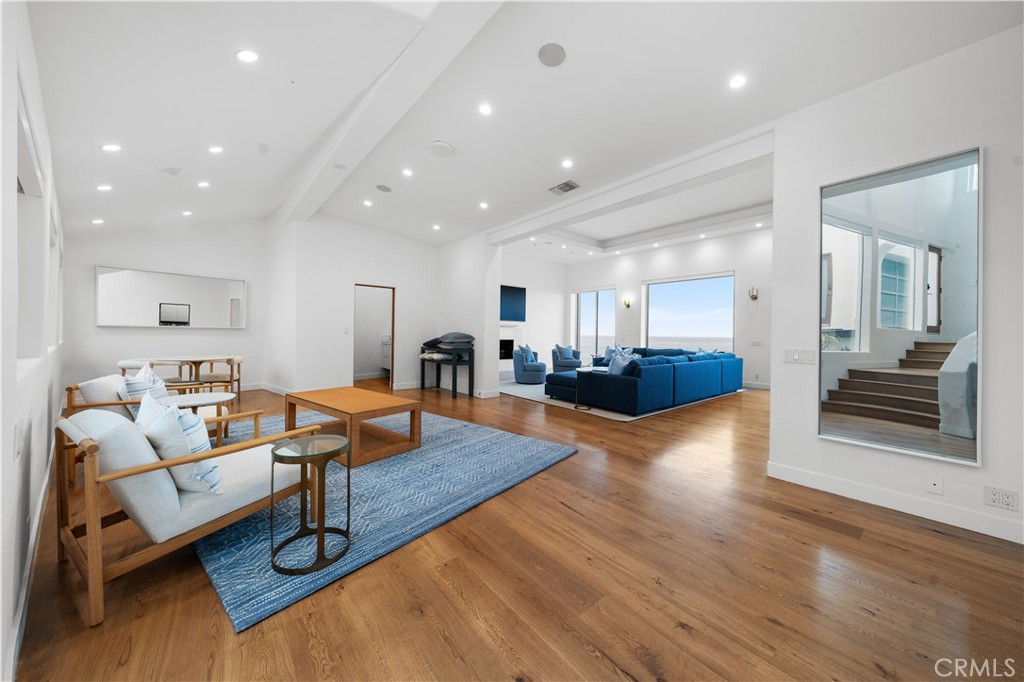 31654 Broad Beach Road Malibu, CA 90265 - Photo 9 of 75 a living room with furniture and a wooden floor