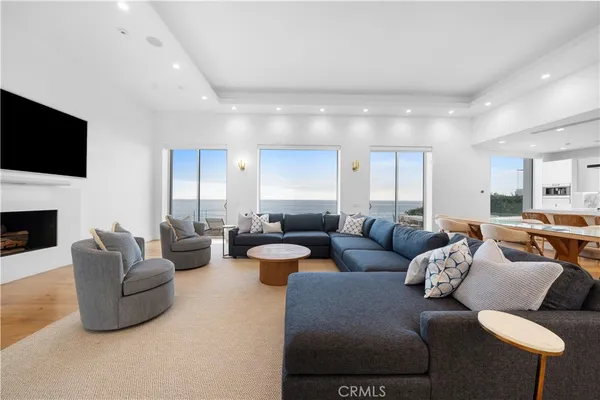a living room with furniture and a table