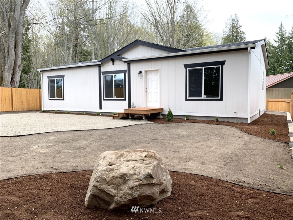 4590 Lake Terrell Road Ferndale, WA 98248 - Photo 1 of 25 a front view of a house with a yard