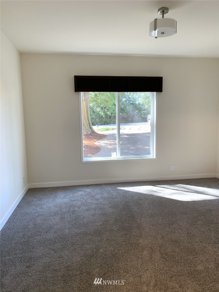 4590 Lake Terrell Road Ferndale, WA 98248 - Photo 11 of 25 an empty room with a window