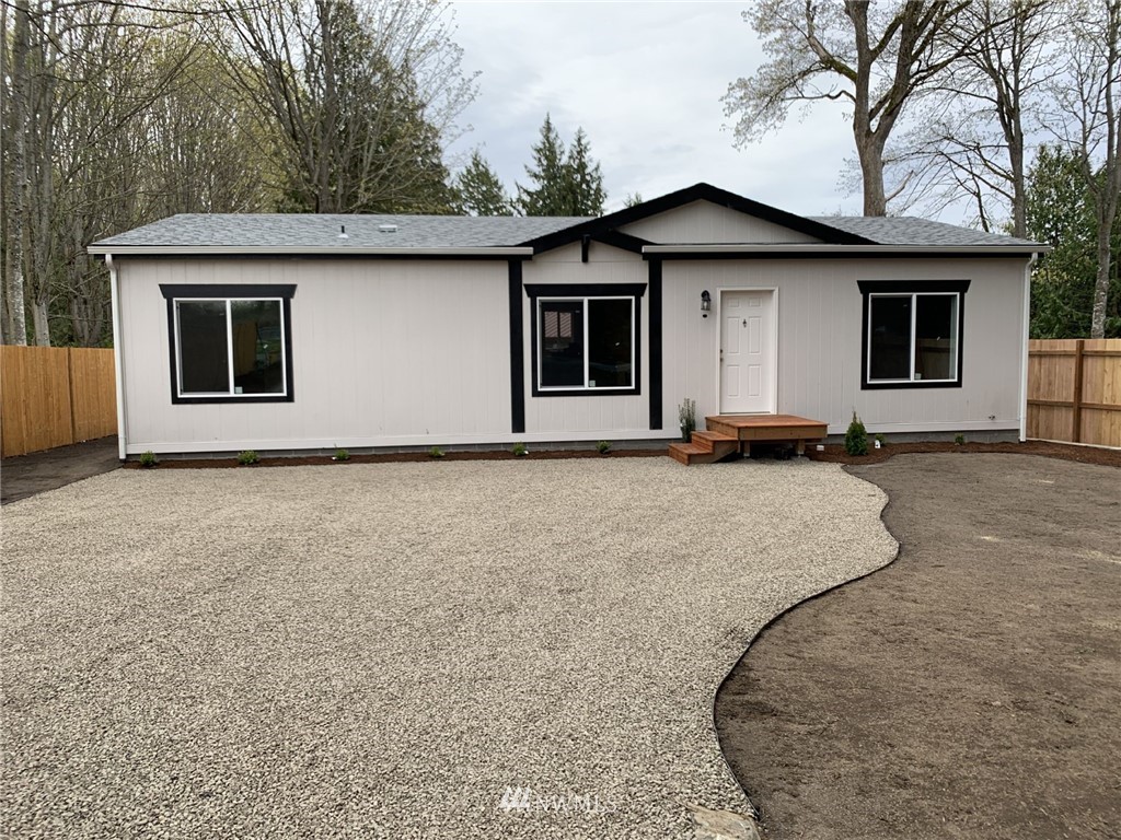 4590 Lake Terrell Road Ferndale, WA 98248 - Photo 4 of 25 a house with trees in the background