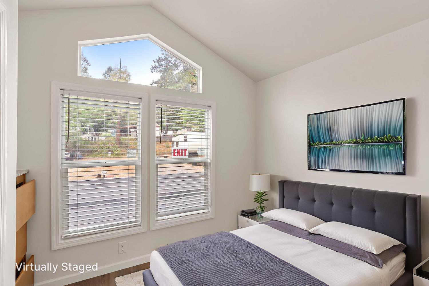 4482 Moran Road, Unit 56 Avery, CA 95224 - Photo 12 of 17 a bedroom with a bed and a painting on the wall