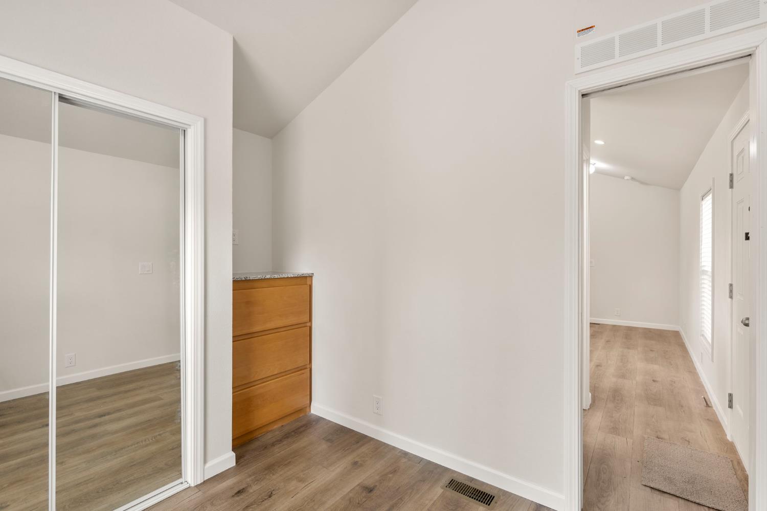 4482 Moran Road, Unit 56 Avery, CA 95224 - Photo 17 of 17 an empty room with wooden floor