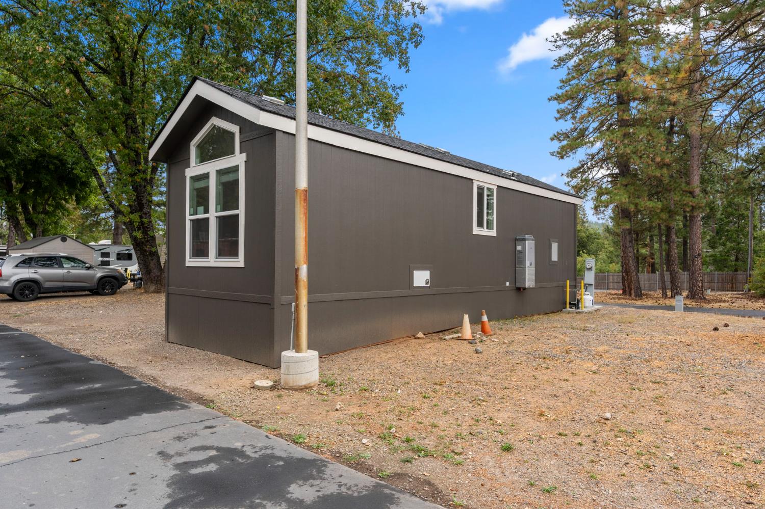 4482 Moran Road, Unit 56 Avery, CA 95224 - Photo 4 of 17 a front view of a house with a yard