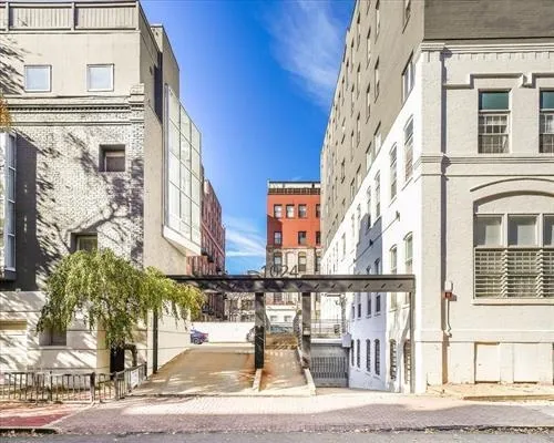 a view of a building with a street