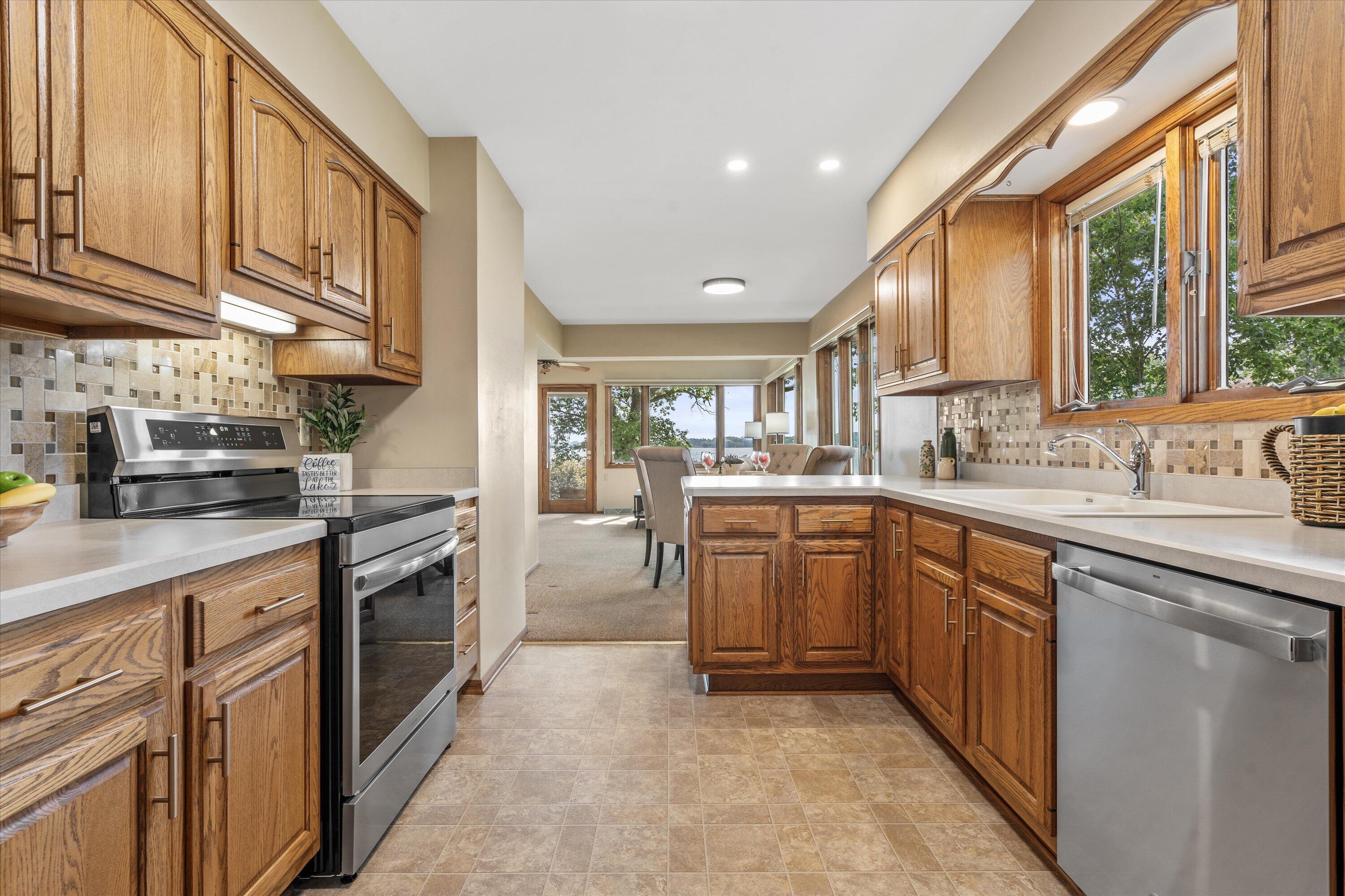7301 West Wind Lake Road Norway, WI 53185 - Photo 12 of 62 Abundant Cabinetry and a pantry!
