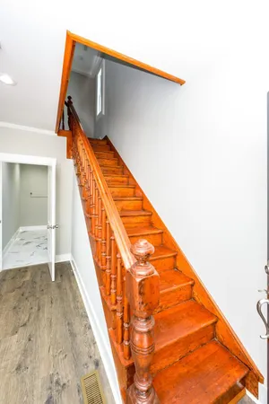 a view of entryway with wooden floor