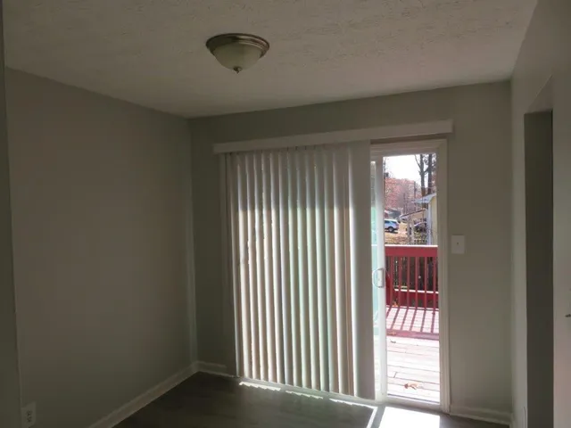 a view of a room that has a window in it