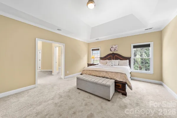 a large spacious bathroom with a large tub shower and sink