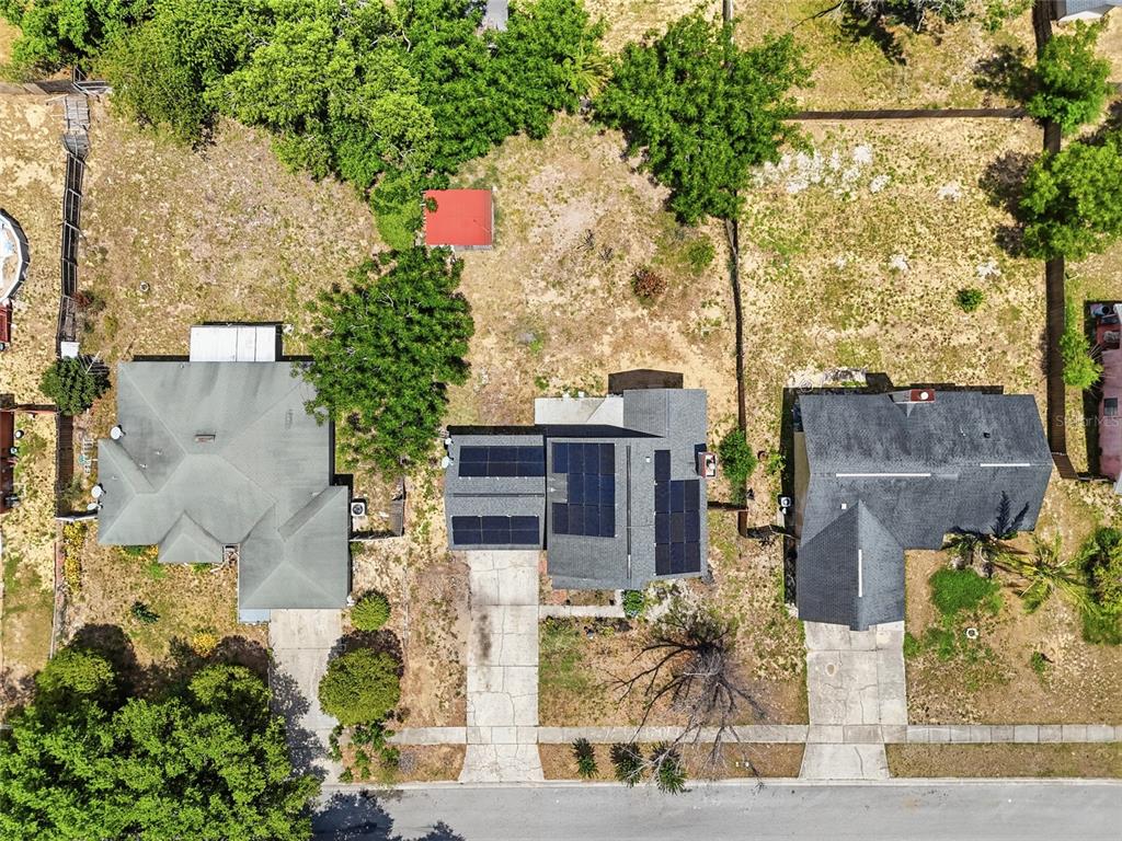 3027 Queens Gate Road Orlando, FL 32818 - Photo 4 of 6 an aerial view of multiple house