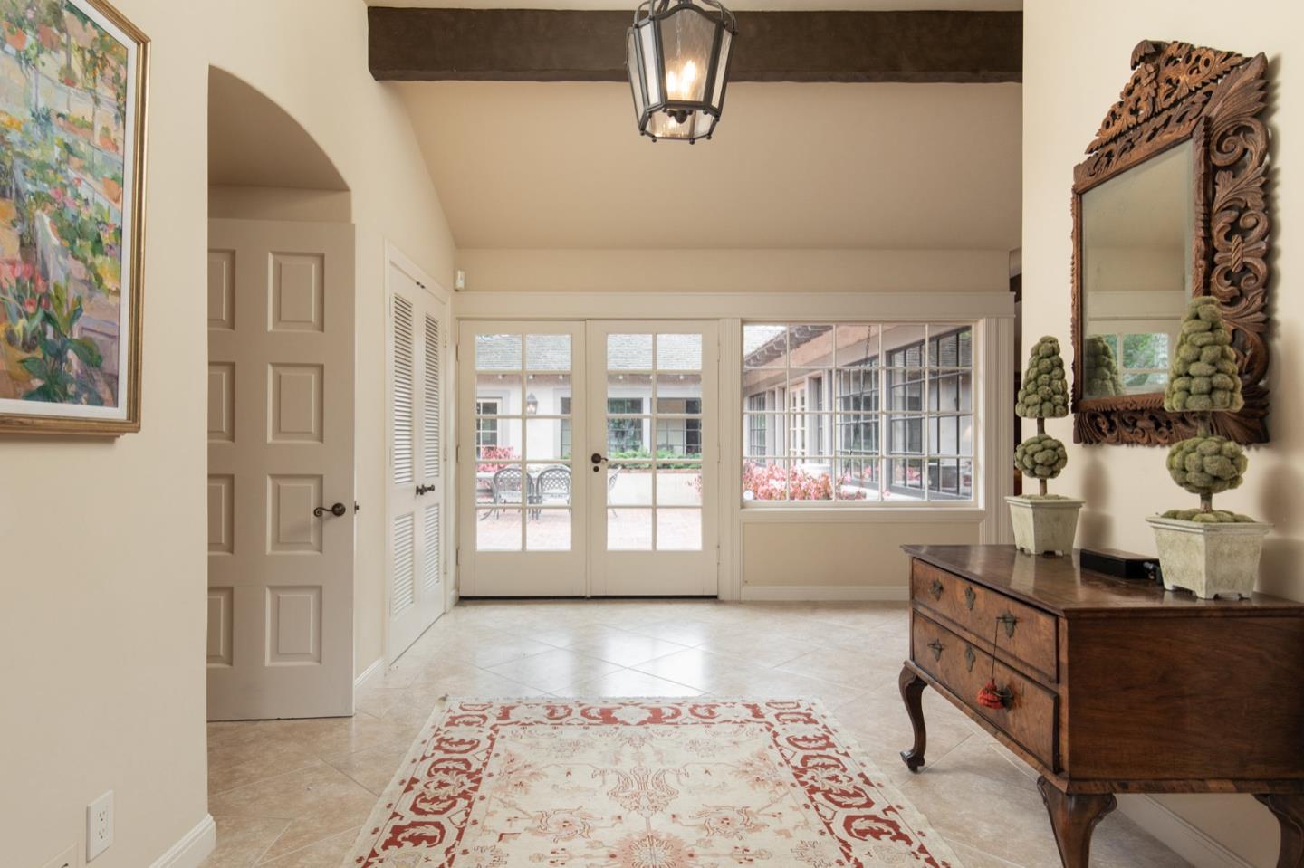 1427 Riata Road Pebble Beach, CA 93953 - Photo 5 of 24 a room with furniture and window