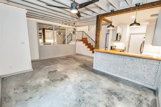 a view of a hallway with staircase