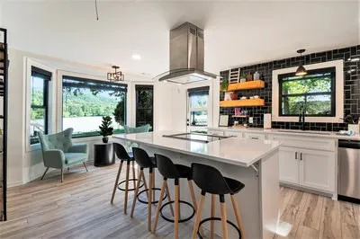 a view of a dining room with furniture window and outside view