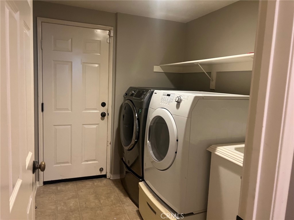 155 Zephyr Run Tustin, CA 92782 - Photo 10 of 29 1st Floor Laundry Room