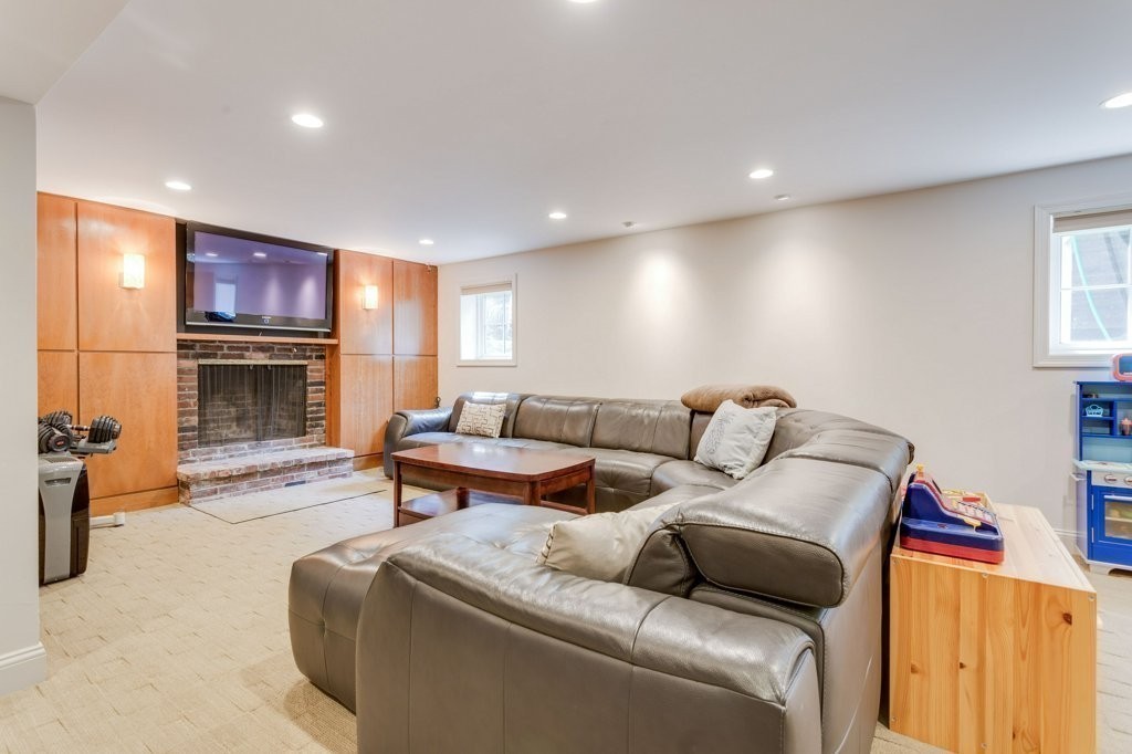226 Conant Road Weston, MA 02493 - Photo 18 of 23 a living room with furniture fireplace and a window