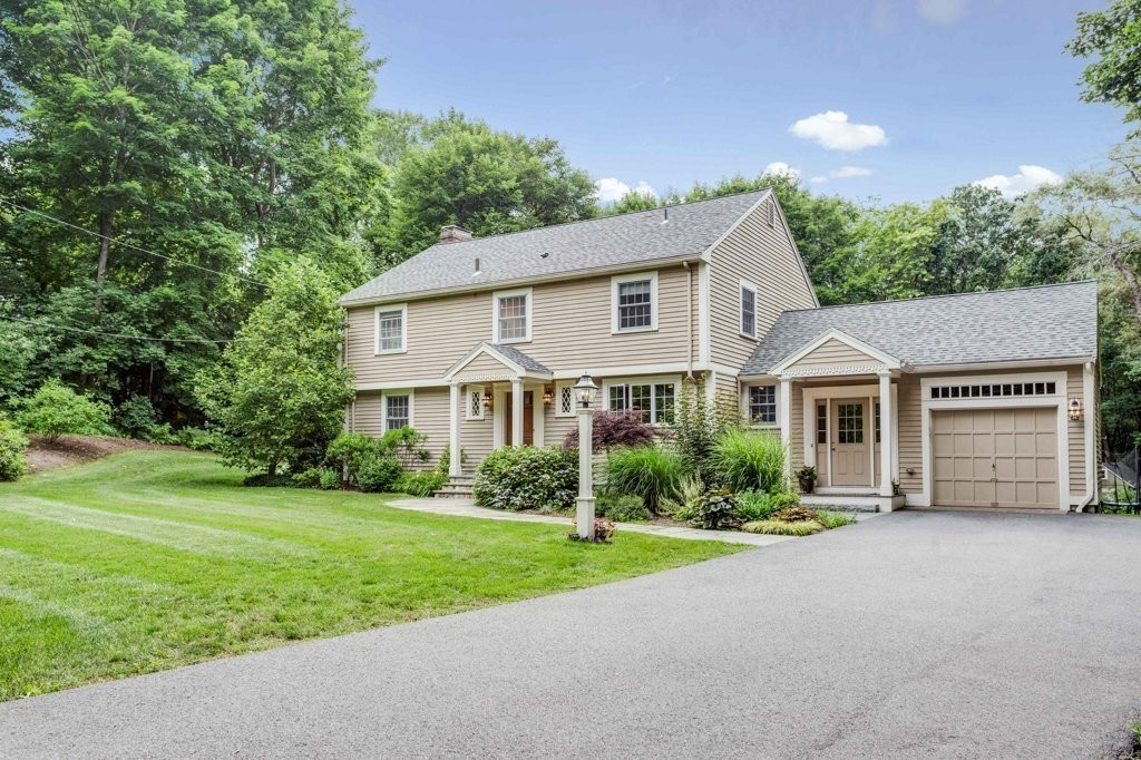 226 Conant Road Weston, MA 02493 - Photo 23 of 23 front view of a house with a yard