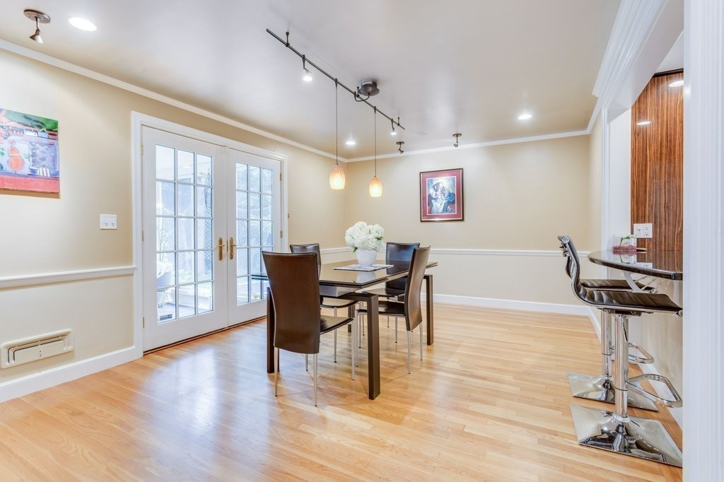 226 Conant Road Weston, MA 02493 - Photo 6 of 23 a view of a dining room with furniture and wooden floor