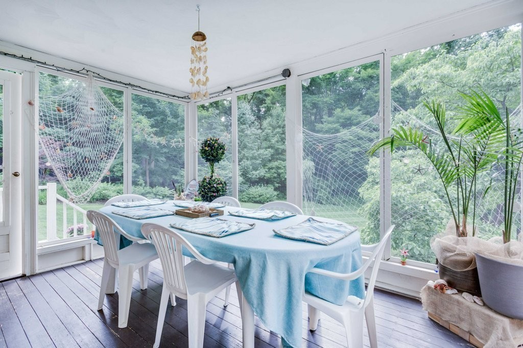 226 Conant Road Weston, MA 02493 - Photo 8 of 23 a view of a dining room with furniture window and wooden floor