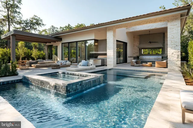 a view of a house with backyard porch and patio
