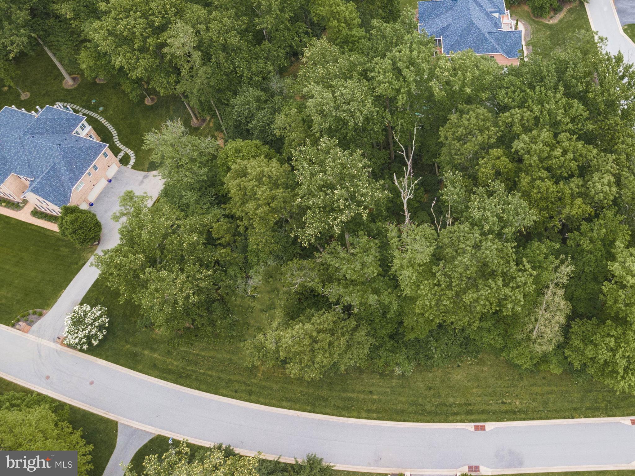 1 Norfolk Court Reisterstown, MD 21136 - Photo 10 of 16 a view of a yard with wooden fence