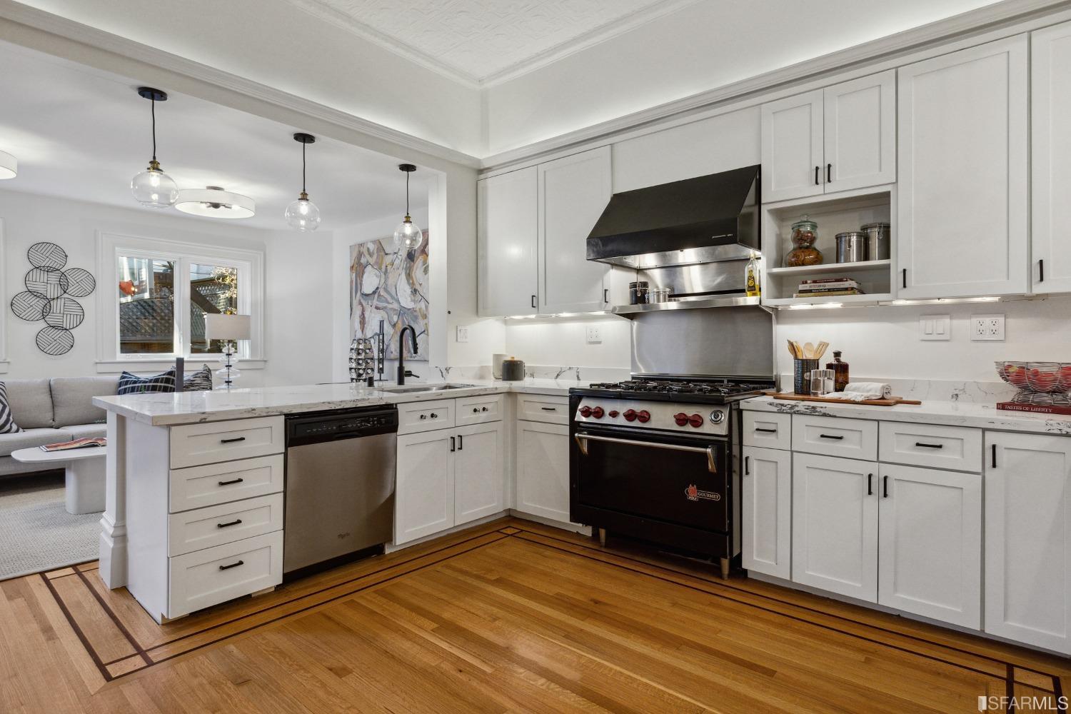 151 Broderick Street San Francisco, CA 94117 - Photo 15 of 39 a kitchen with stainless steel appliances granite countertop a stove and a sink