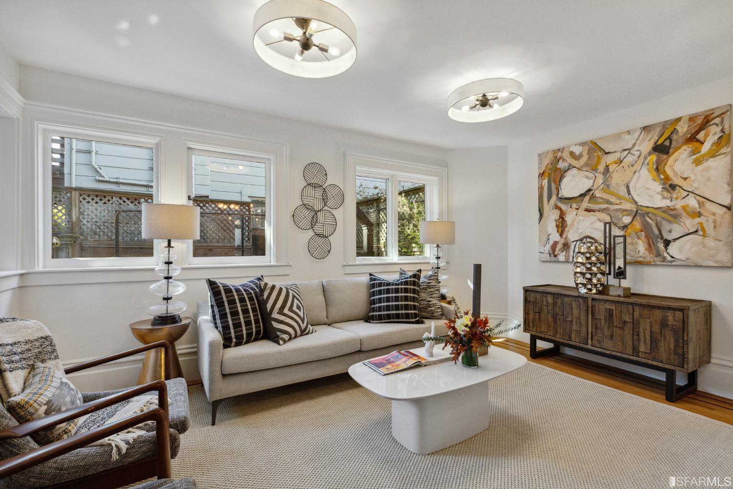 151 Broderick Street San Francisco, CA 94117 - Photo 16 of 39 a living room with furniture and a wooden floor
