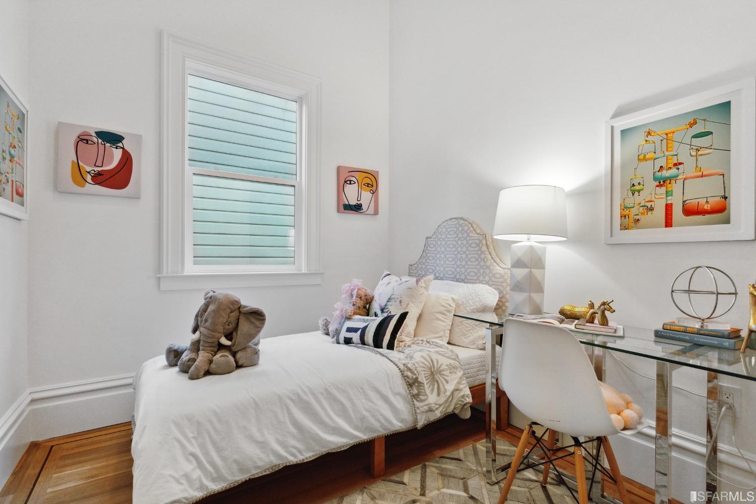 151 Broderick Street San Francisco, CA 94117 - Photo 20 of 39 a bedroom with bed and a window