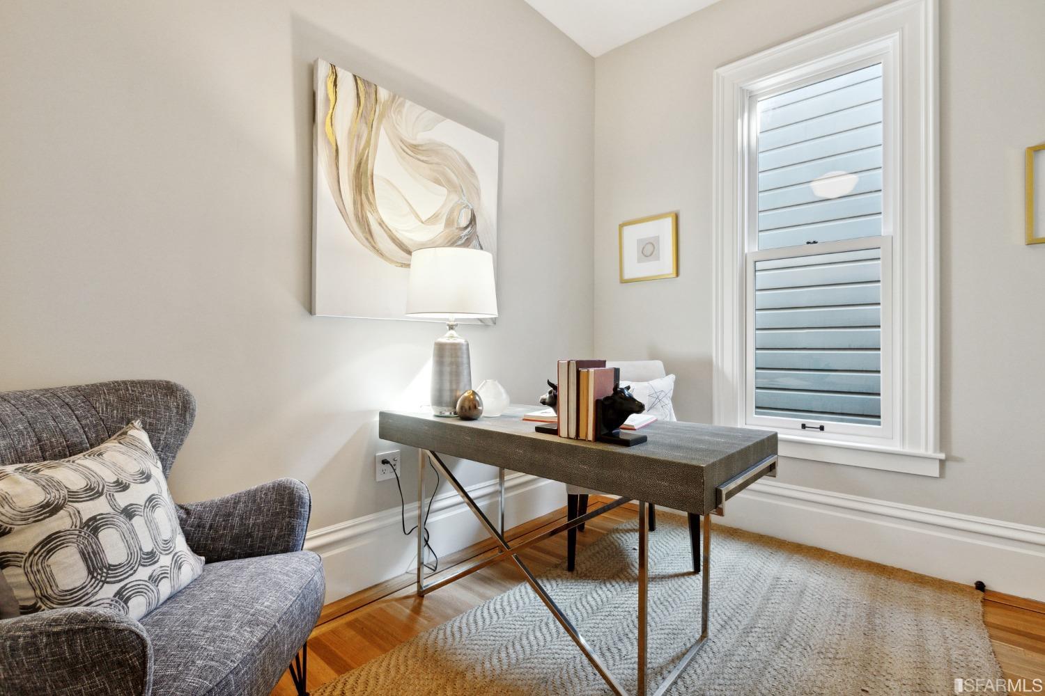 151 Broderick Street San Francisco, CA 94117 - Photo 24 of 39 a livingroom with workspace and a couch