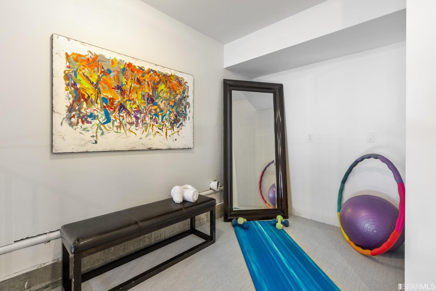 151 Broderick Street San Francisco, CA 94117 - Photo 33 of 39 a room with wooden floor and furniture