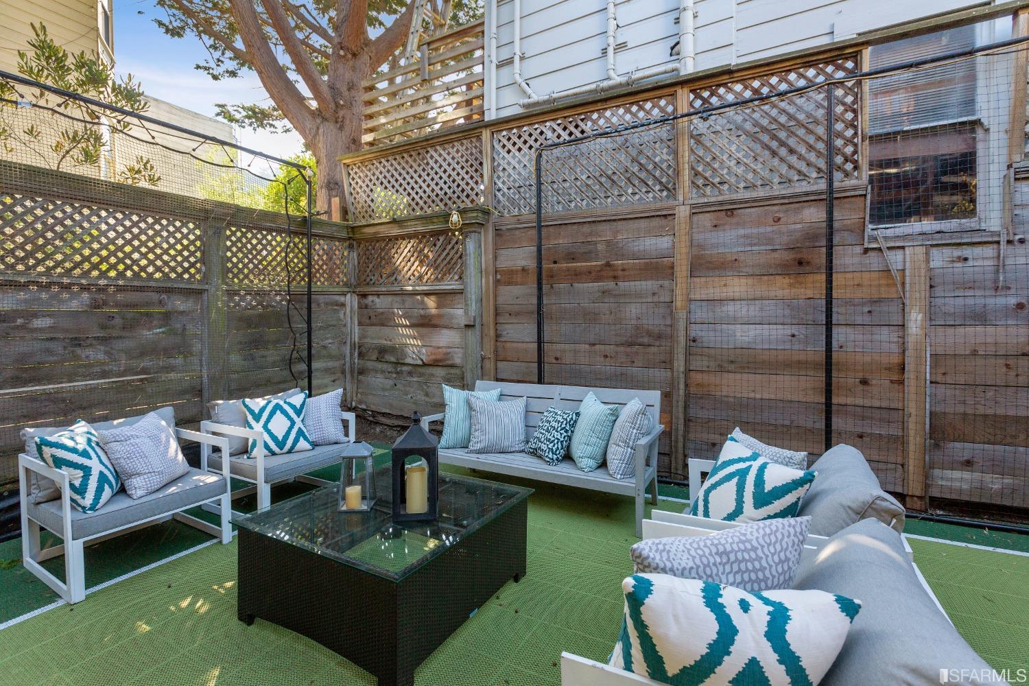 151 Broderick Street San Francisco, CA 94117 - Photo 38 of 39 a outdoor living space with patio furniture and a garden