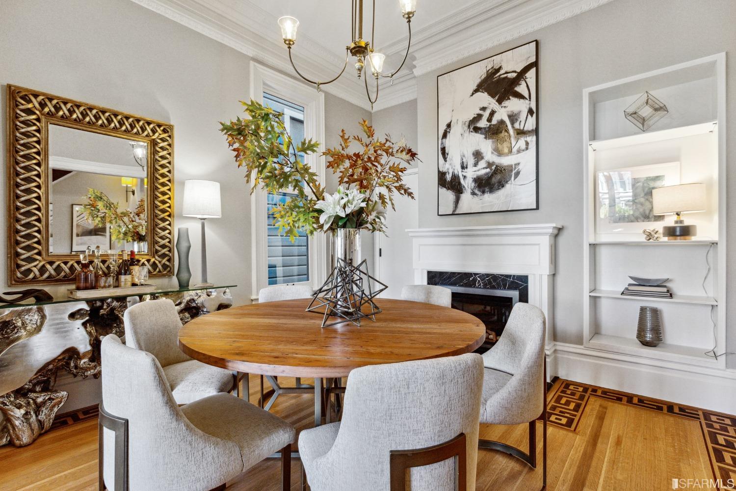 151 Broderick Street San Francisco, CA 94117 - Photo 9 of 39 a dining table with fireplace and wooden floor