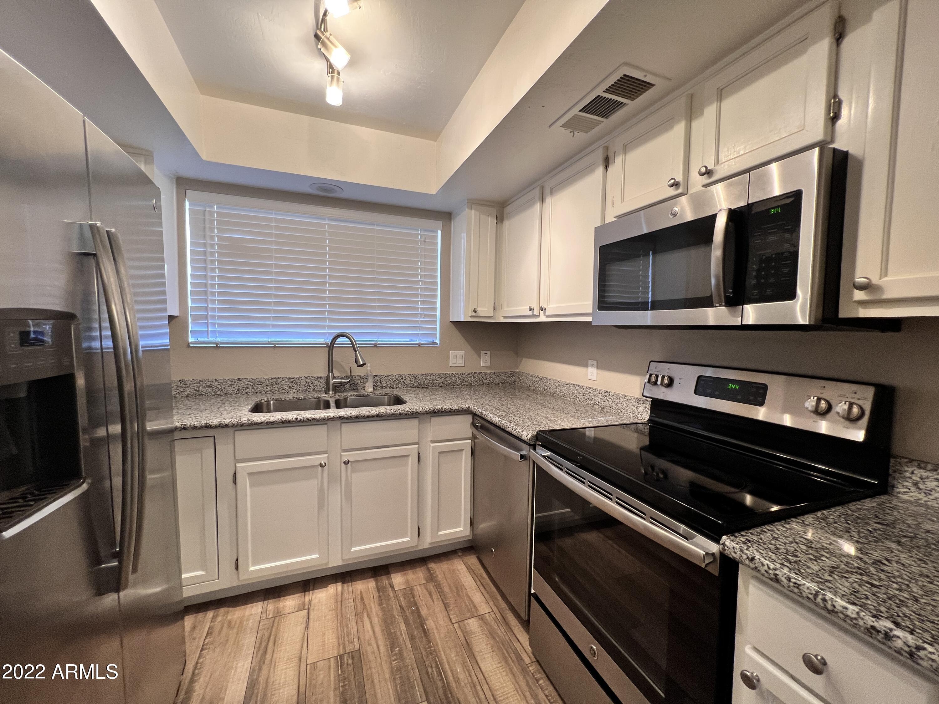 4216 West Boca Raton Road Phoenix, AZ 85053 - Photo 1 of 18 Kitchen