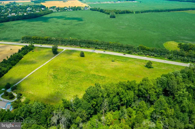 a view of a swimming pool and outdoor space
