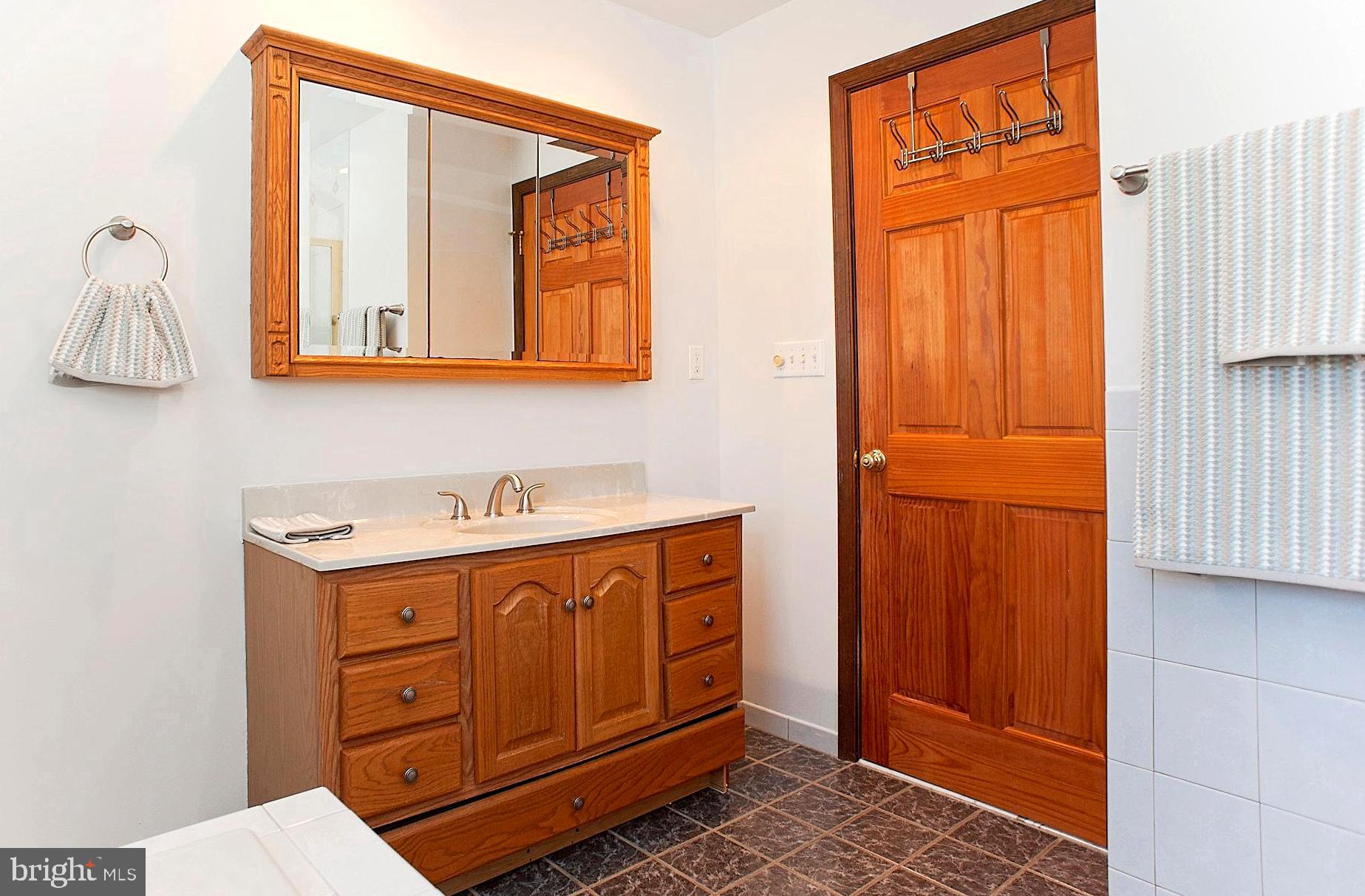 305 Holly Road Edgewater, MD 21037 - Photo 22 of 33 Attractively Appointed/Tiled En Suite Bath