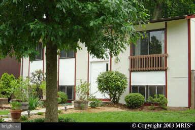 11583 Embers Court Reston, VA 20191 - Photo 1 of 1 a view of house with yard and outdoor seating
