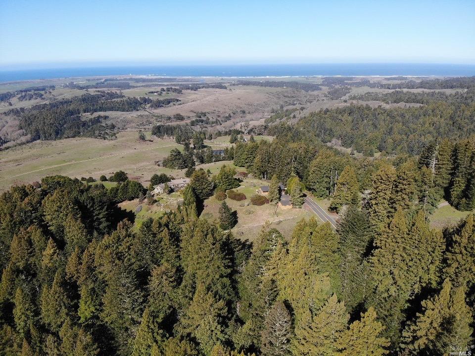 40855 Mountain View Road Manchester, CA 95459 - Photo 1 of 1 an aerial view of house with yard and mountain view in back